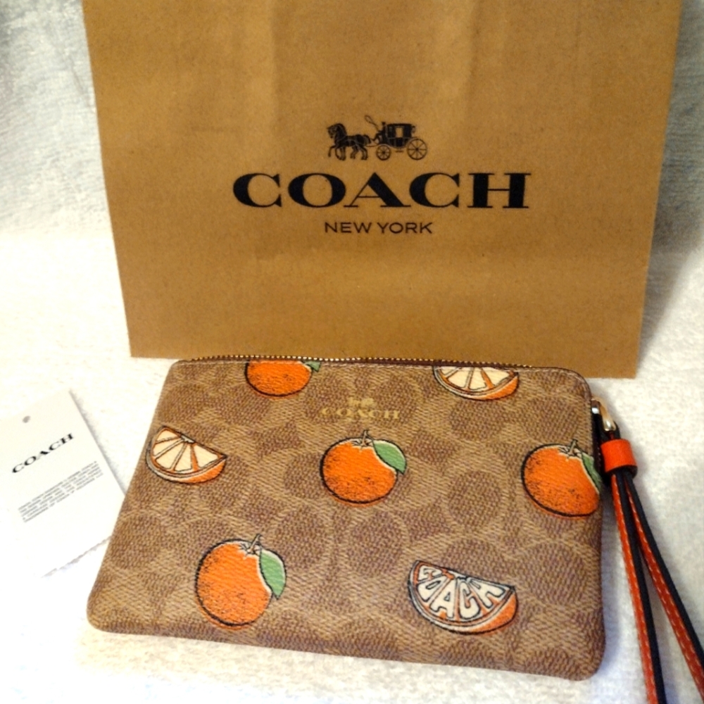 Coach Signature Wristlet  🍊🍊